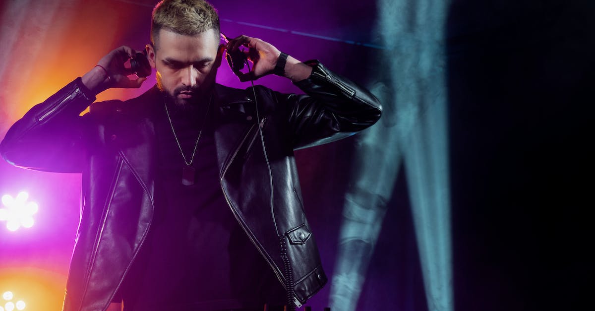 What is the song playing during Prop Hunt (Prop Party)? - Self assured young bearded male DJ in trendy leather jacket adjusting headphones while performing music on stage in dark illuminated nightclub What is the song playing during Prop Hunt (Prop Party)? - Self assured young bearded male DJ in trendy leather jacket adjusting headphones while performing music on stage in dark illuminated nightclub