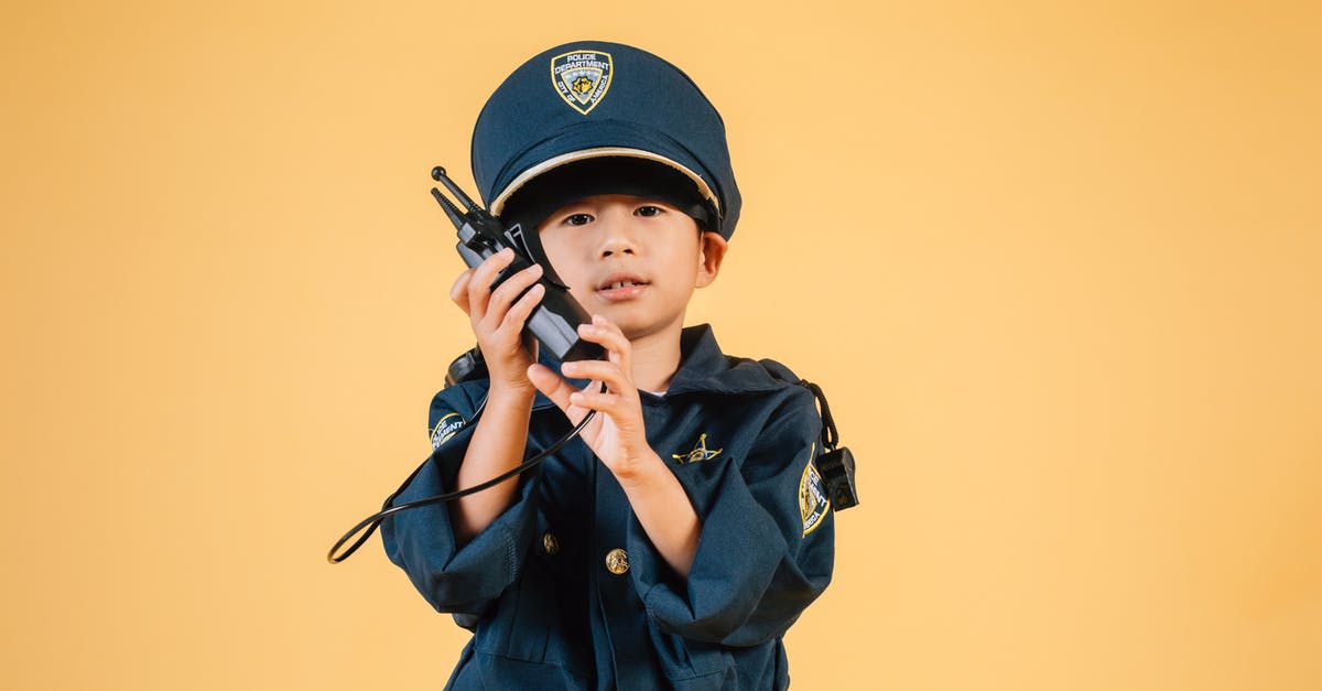 What is the Target Dummy used for? - Serious Asian kid in police uniform with transceiver What is the Target Dummy used for? - Serious Asian kid in police uniform with transceiver
