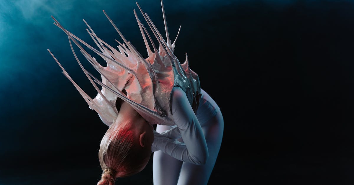What is the Trigger for Biota Attacks in Alien Legacy? - Woman in Blue and White Body Paint