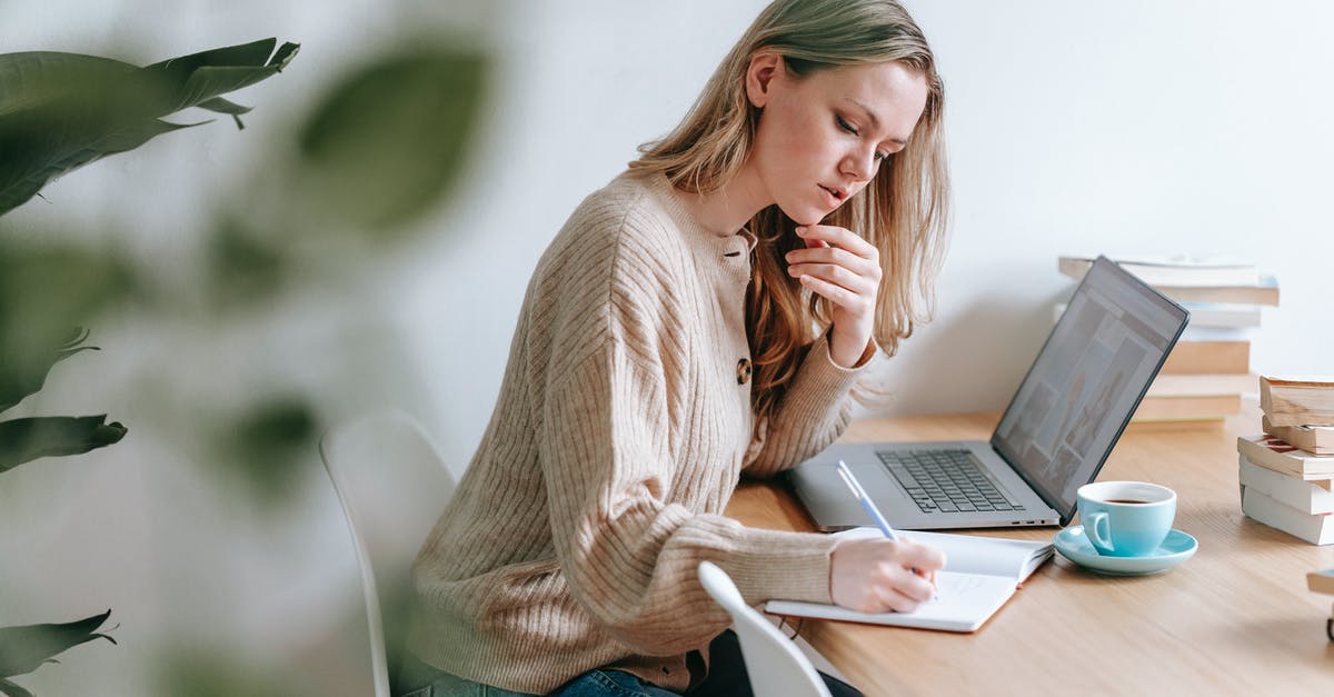 What is the use of research table in rust? - Pensive woman taking notes at table with laptop and cup of coffee What is the use of research table in rust? - Pensive woman taking notes at table with laptop and cup of coffee