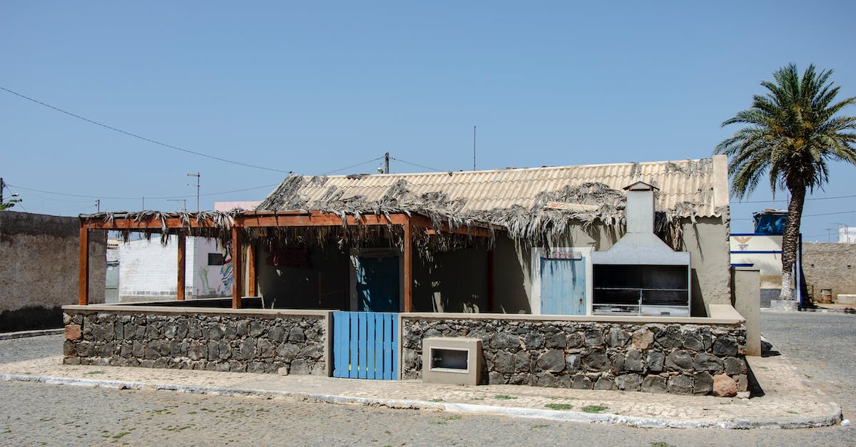 What is this Asura gate for? - Brown and White Concrete House Under Blue Sky What is this Asura gate for? - Brown and White Concrete House Under Blue Sky
