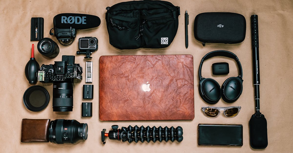 What is this Gen system in multiplayer and how does it work? [duplicate] - Overhead view of laptop and photo camera composed with headphones and other gadgets of professional photographer