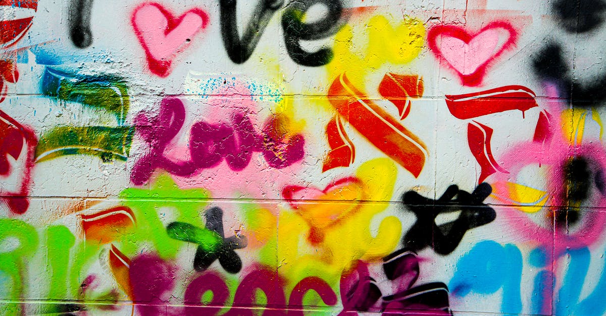 What is this graffiti on the walls in Portal 1? - Purple Red and Yellow Graffiti What is this graffiti on the walls in Portal 1? - Purple Red and Yellow Graffiti