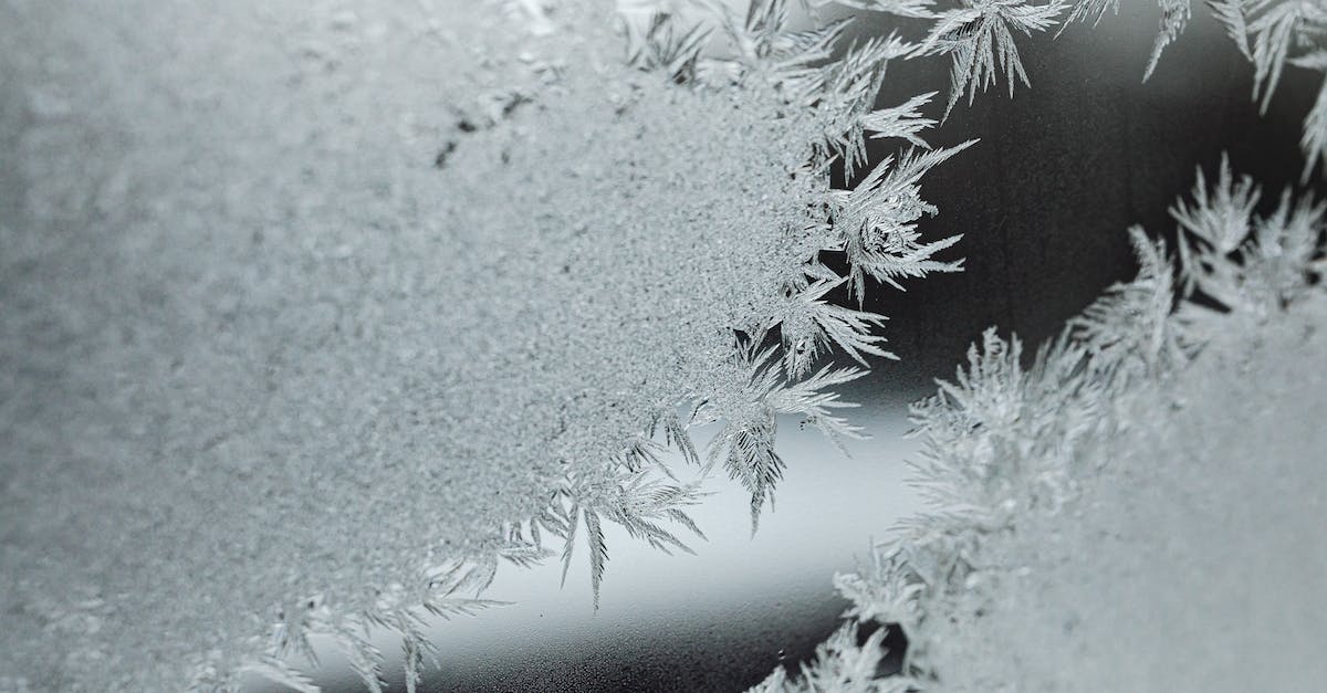 What is this snowflake? - White Snow on Black Textile What is this snowflake? - White Snow on Black Textile