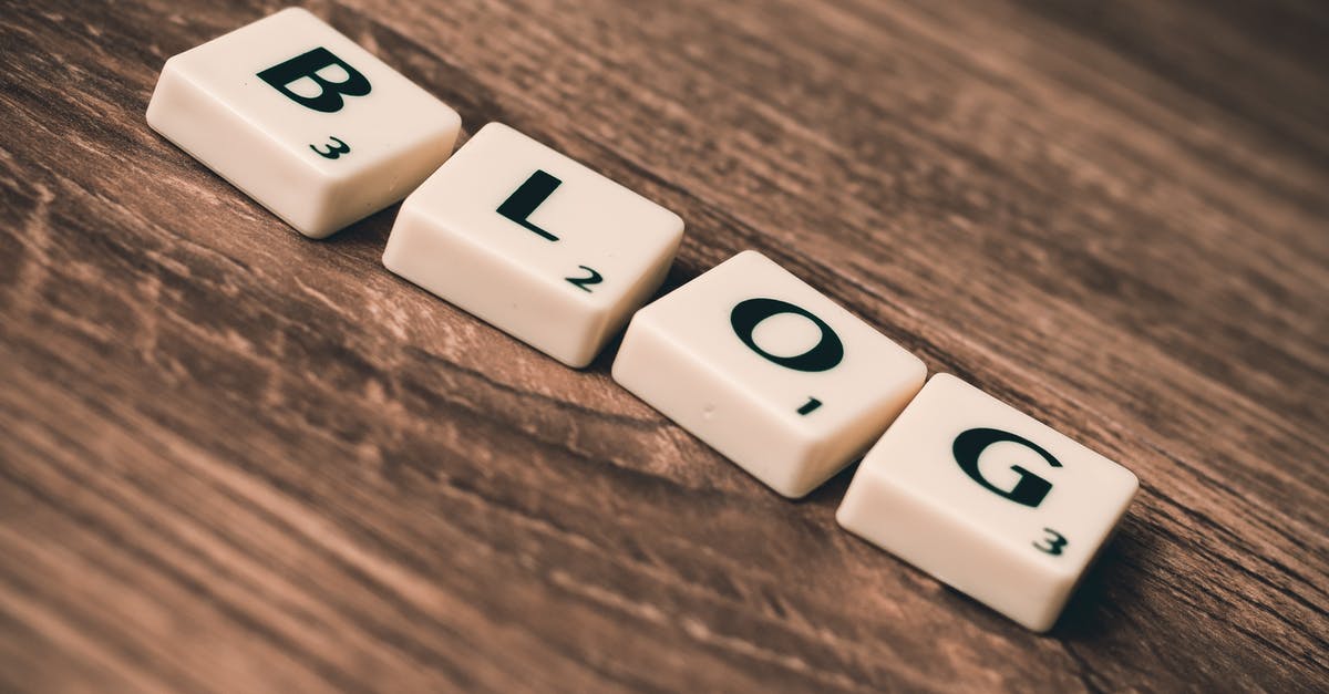 What is this spinning pokeball icon in the corner? [duplicate] - Blog Letters on Brown Wood