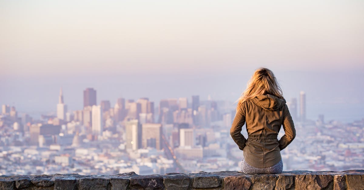 What is uncovered by synchronizing at viewpoints? - Woman on Rock Platform Viewing City What is uncovered by synchronizing at viewpoints? - Woman on Rock Platform Viewing City
