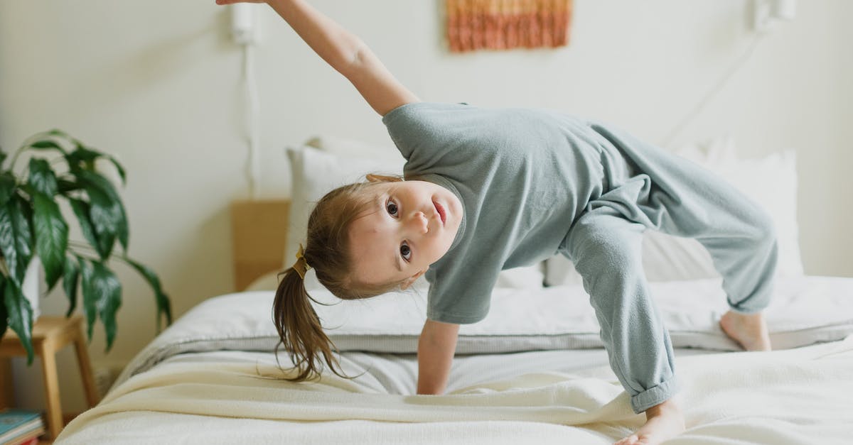 What kind of areas have folks been finding Gastly's? [duplicate] - Adorable little girl having fun on bed at home