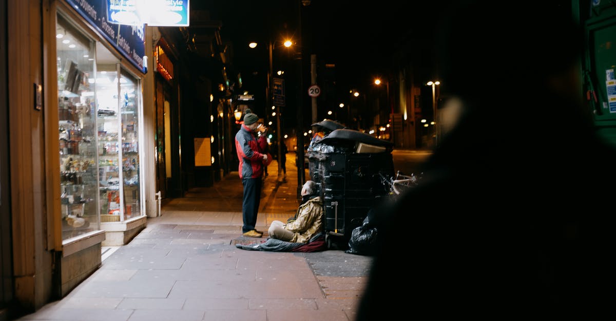 What kind of gear should I have before I start doing veteran(hard mode) group dungeons? - Anonymous man giving money to poor beggar on tiled sidewalk near shop showcases in town at dusk What kind of gear should I have before I start doing veteran(hard mode) group dungeons? - Anonymous man giving money to poor beggar on tiled sidewalk near shop showcases in town at dusk