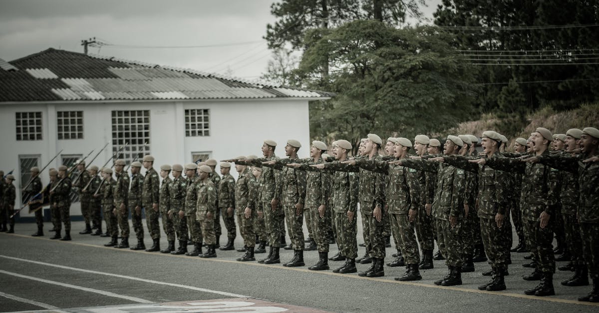 What language are the soldiers speaking in Mission 19 "On the Trail"? - Free stock photo of adult, army, battle