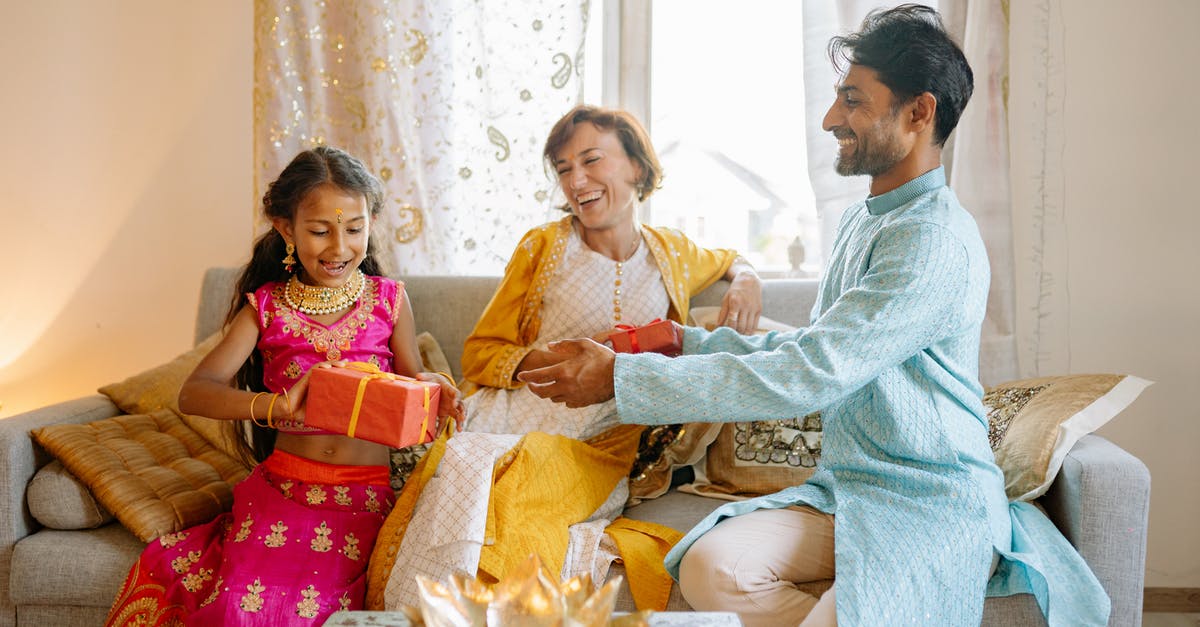 What level do you start receiving gifts at? - Girl in Pink Sari Receiving a Gift