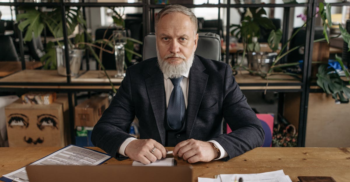 What loot does the boss drop? - Man in Black Suit Jacket Sitting at the Table What loot does the boss drop? - Man in Black Suit Jacket Sitting at the Table