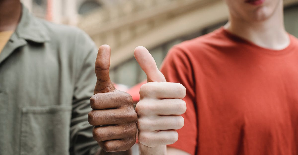 What makes a god excel in a support role? - Unrecognizable multiracial guys showing thumbs up gesture What makes a god excel in a support role? - Unrecognizable multiracial guys showing thumbs up gesture