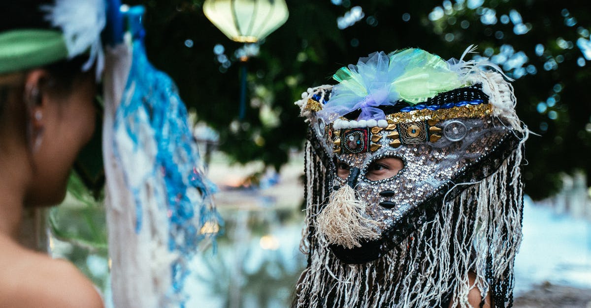 What mask is this? - Blue and White Feather Mask What mask is this? - Blue and White Feather Mask