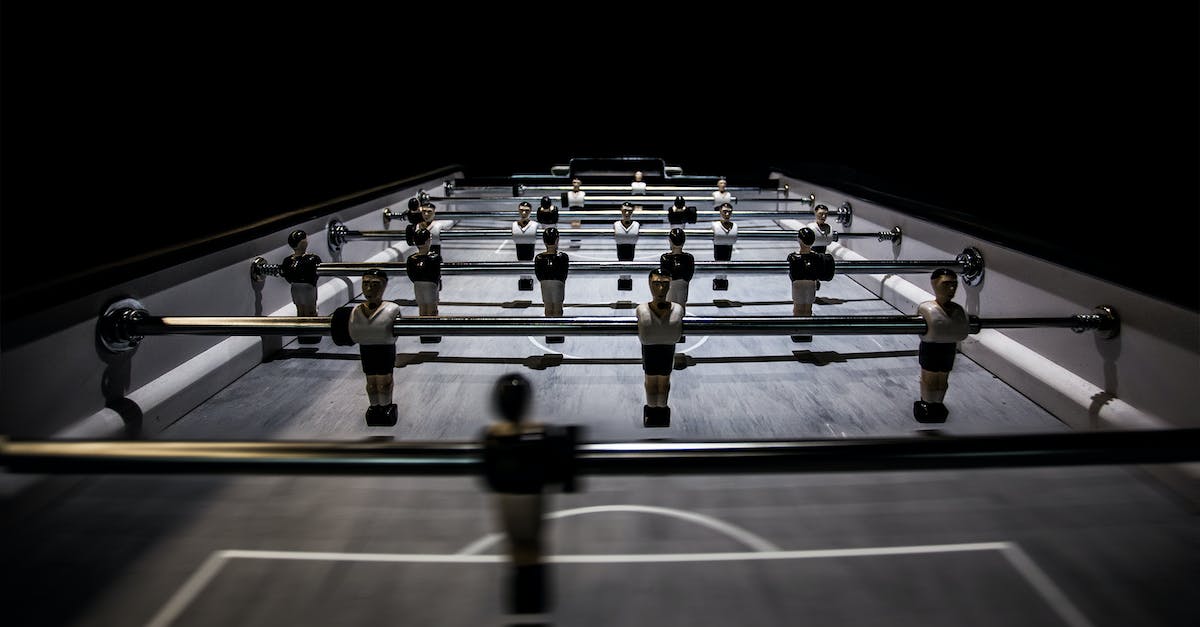 What mini games in mii plaza give you hats? - Selective Focus Photography of Foosball Table
