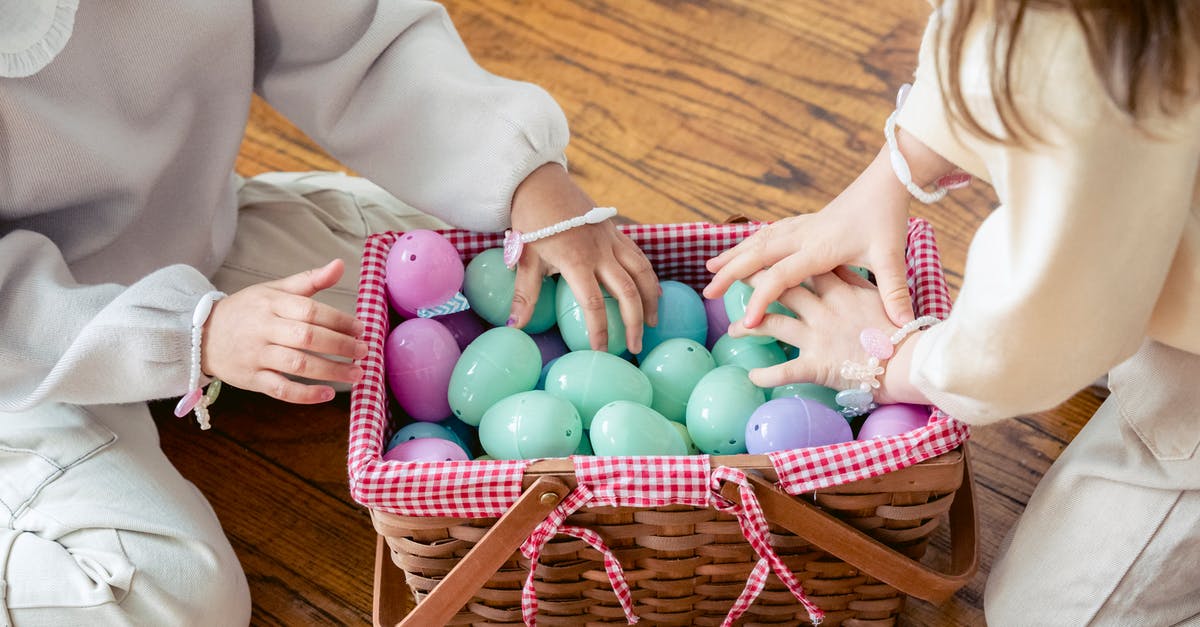What missions do I have to play to collect all the Bobbleheads in Fallout 4? - Crop faceless kids playing with artificial Easter eggs on floor at home