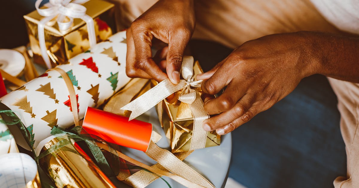 What powers do the ribbons possess? - Person Holding Red and White Gift Box What powers do the ribbons possess? - Person Holding Red and White Gift Box