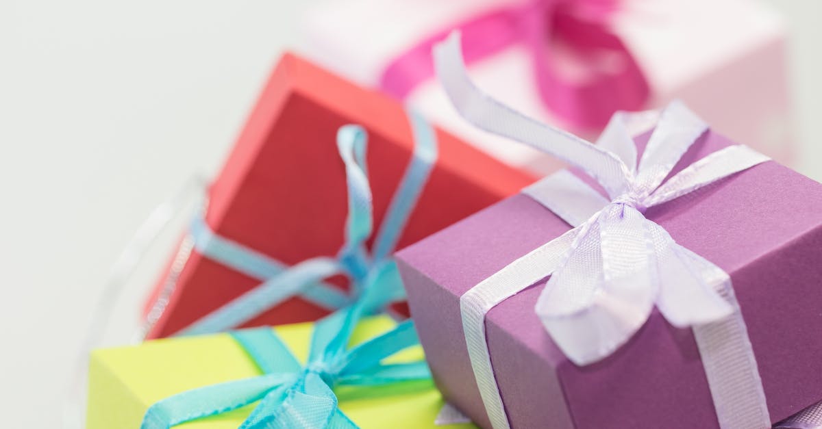 What powers do the ribbons possess? - Selective Focus Photography of Gift Boxes What powers do the ribbons possess? - Selective Focus Photography of Gift Boxes