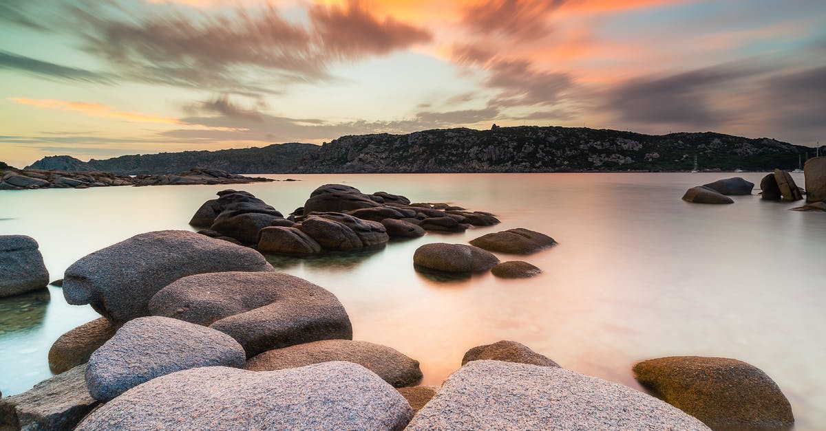 What skills/passives proc Tal Rasha stacks, but are not cast for Etched Sigil? - Gray Rocks on Body of Water during Sunset