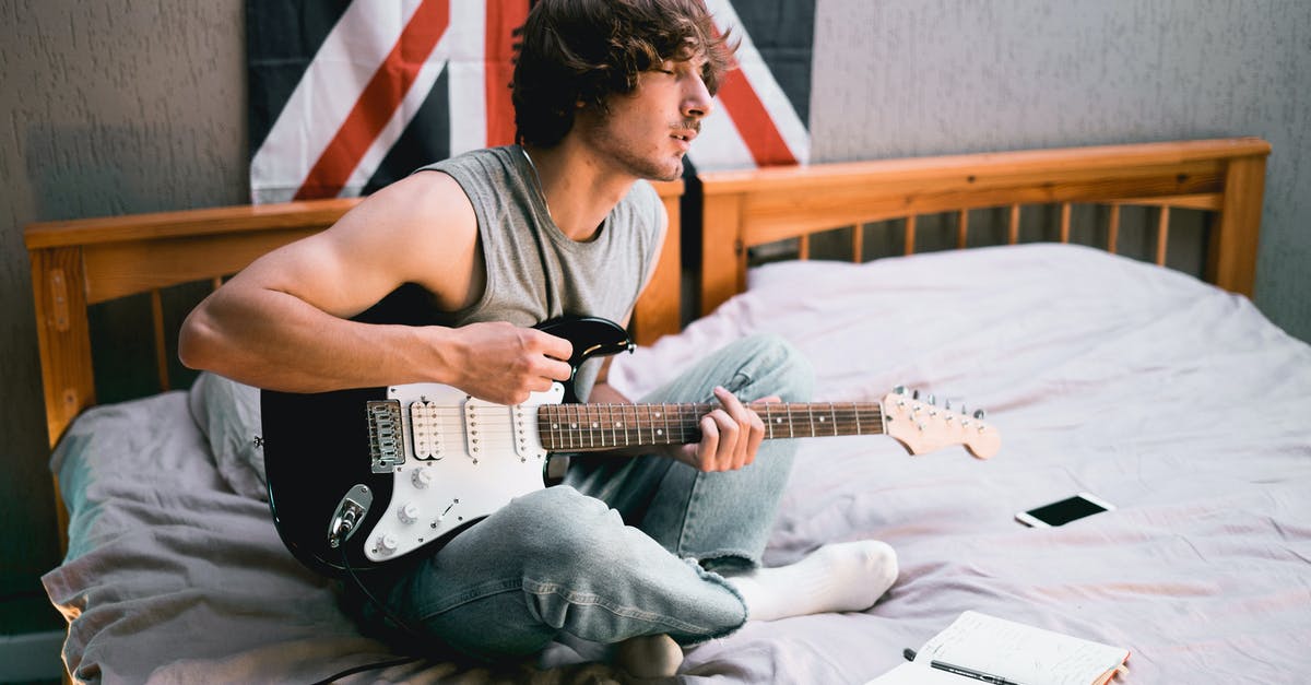 What songs is Lucio playing? - Man in Gray Tank Top Playing Electric Guitar What songs is Lucio playing? - Man in Gray Tank Top Playing Electric Guitar