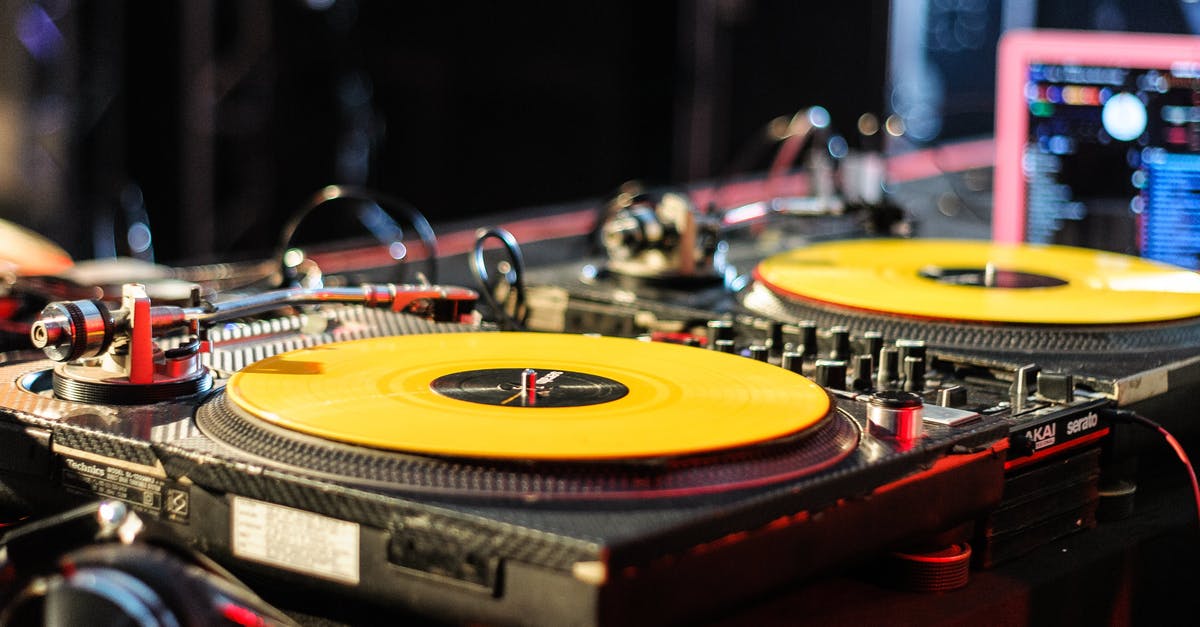 What system is this controller for? - DJ console with records in nightclub What system is this controller for? - DJ console with records in nightclub