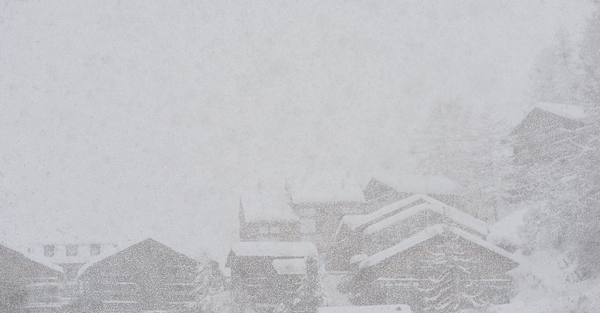 What timezone does Blizzard go by? - Severe scenery of remote rural village houses covered with thick layer of snow during intense snowstorm on cold winter day What timezone does Blizzard go by? - Severe scenery of remote rural village houses covered with thick layer of snow during intense snowstorm on cold winter day