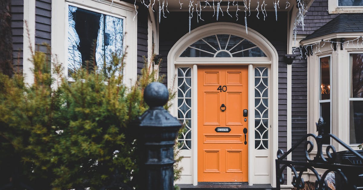What to do when a NPC blocks a doorway or exit? - Exterior of contemporary wooden orange door and black cast iron gates to house What to do when a NPC blocks a doorway or exit? - Exterior of contemporary wooden orange door and black cast iron gates to house