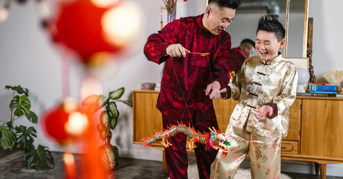What to see before playing Dragon Age:Inquisition -
A Father Playing with a Toy Dragon with His Son What to see before playing Dragon Age:Inquisition -
A Father Playing with a Toy Dragon with His Son