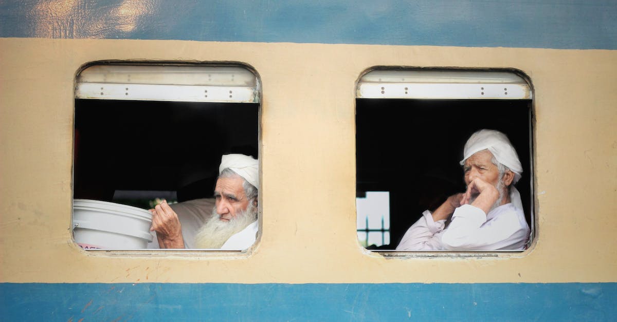 What troops should I train in a level 7 barracks? [closed] - Old Men in Traditional Clothes in Train Windows