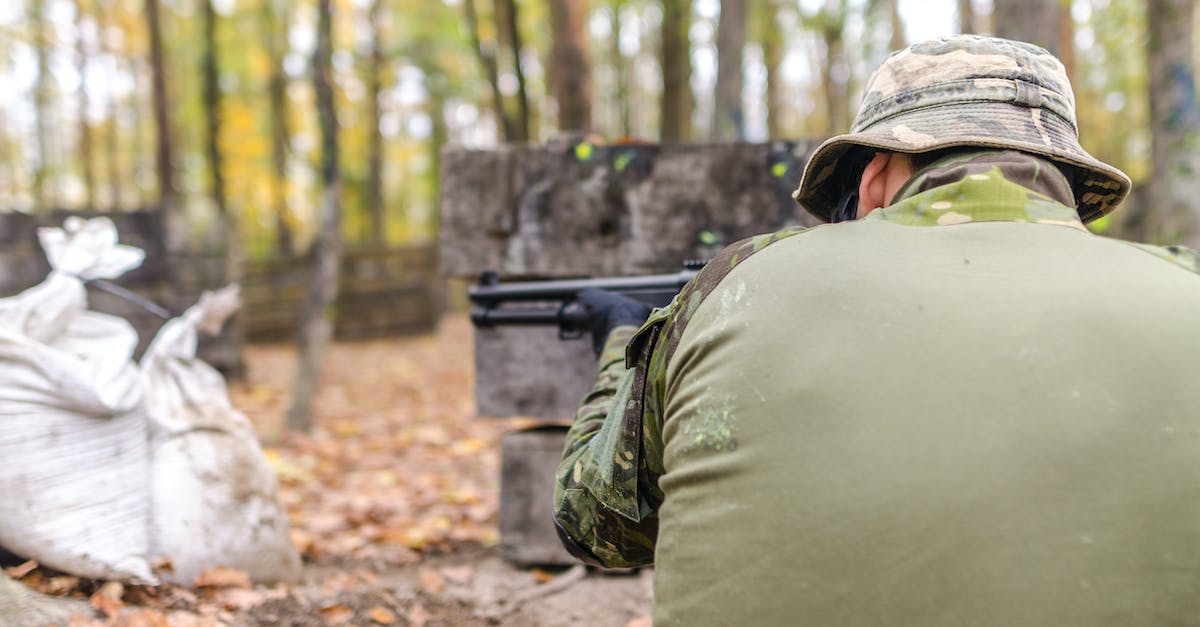 What types of attacks and actions *must* target an enemy with taunt? - Man Holding Rifle