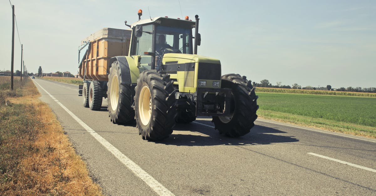 What types of equipment work when driving a spidertron? - Yellow Tractor in Asphalt Road