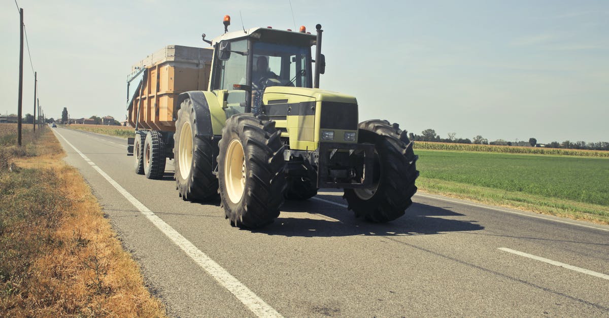 What types of equipment work when driving a spidertron? - Yellow Tractor in Asphalt Road What types of equipment work when driving a spidertron? - Yellow Tractor in Asphalt Road