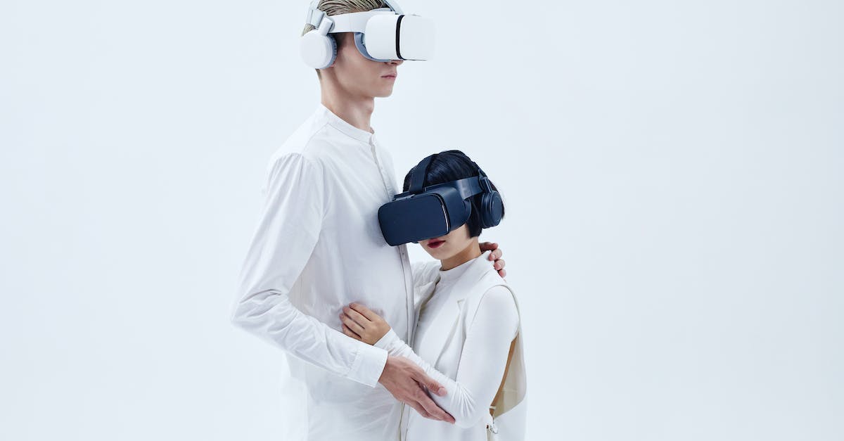 What Warframe quests are there? - Man and Woman Standing Beside Each Other Wearing Oculus Quest