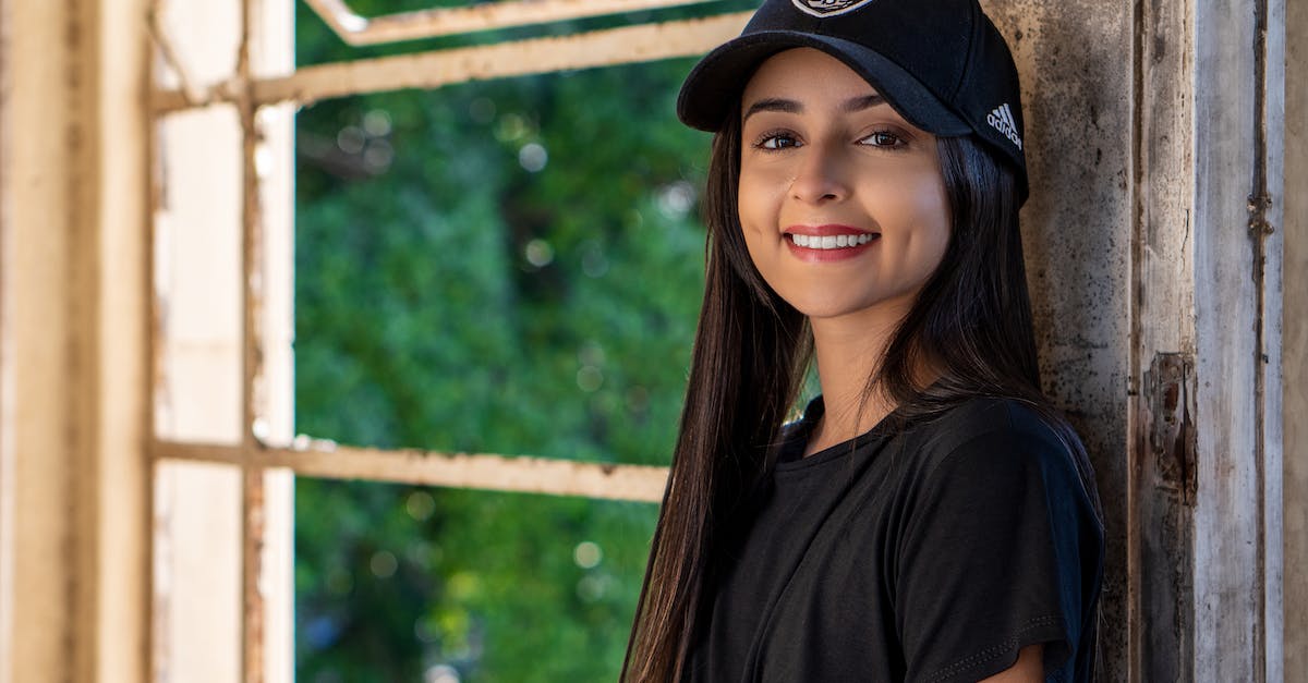 What was the the original level cap on Baldur's Gate 2? - Cheerful ethnic female millennial in trendy cap and t shirt standing in old abandoned building and looking at camera What was the the original level cap on Baldur's Gate 2? - Cheerful ethnic female millennial in trendy cap and t shirt standing in old abandoned building and looking at camera