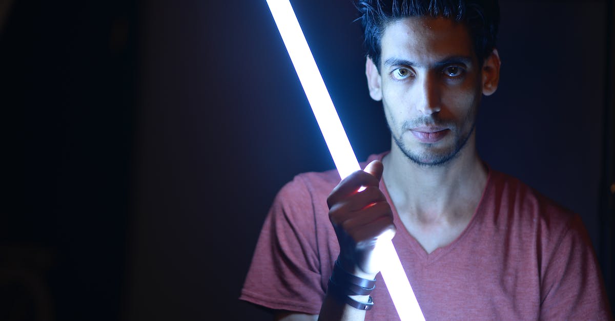 What weapon has the highest Dexterity scaling in Dark Souls 2? - Man Holding Light Saber Sword
