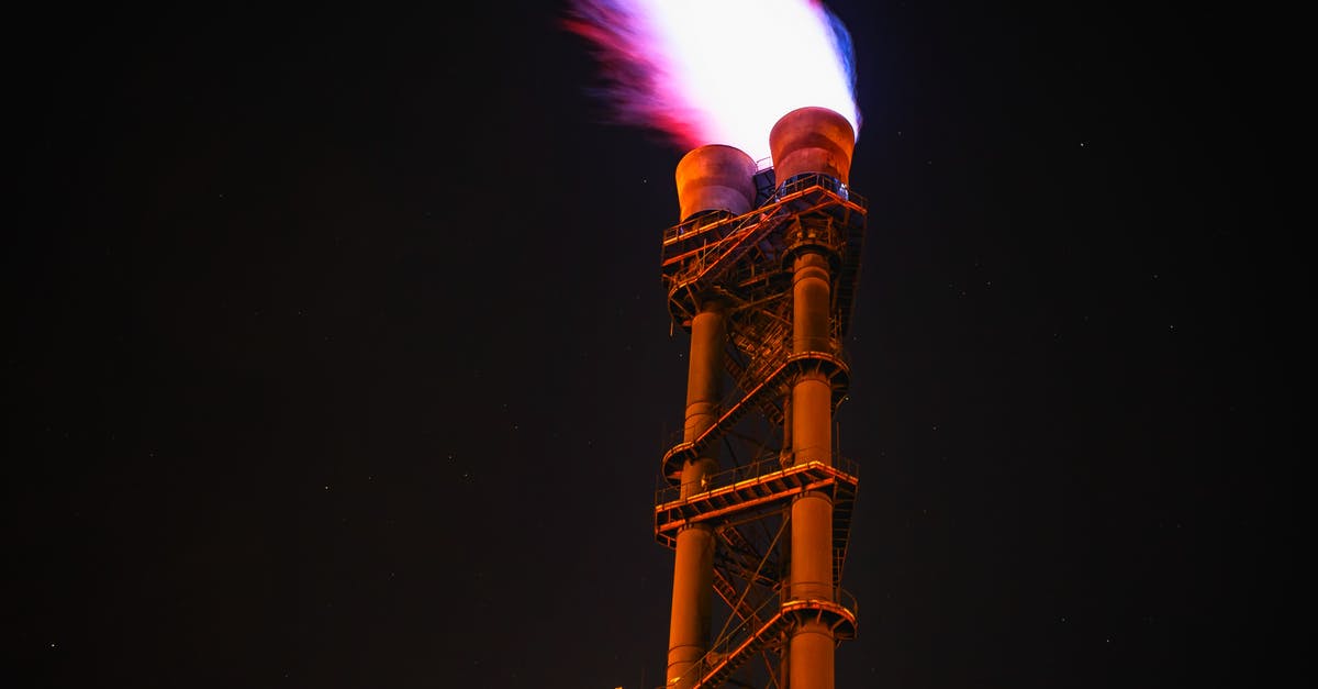 What will happen when I ignite the flammable gas for Keely? - Low Angle View of Illuminated Tower Against Sky at Night