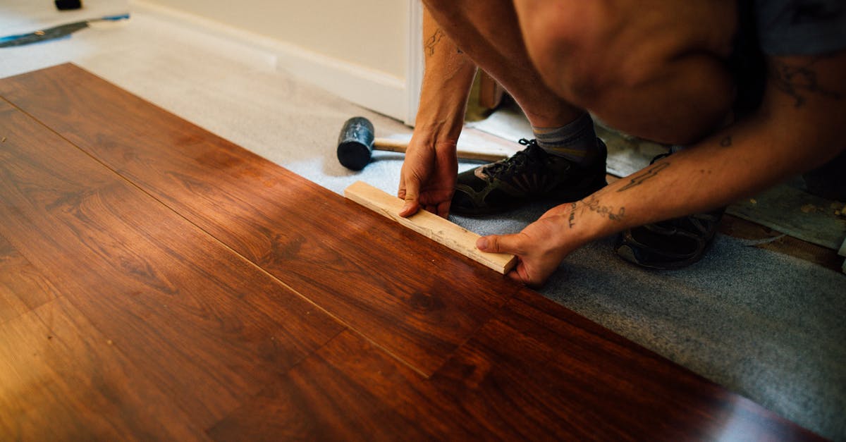 Whats Master Chief's real name - Crop man installing laminate flooring Whats Master Chief's real name - Crop man installing laminate flooring