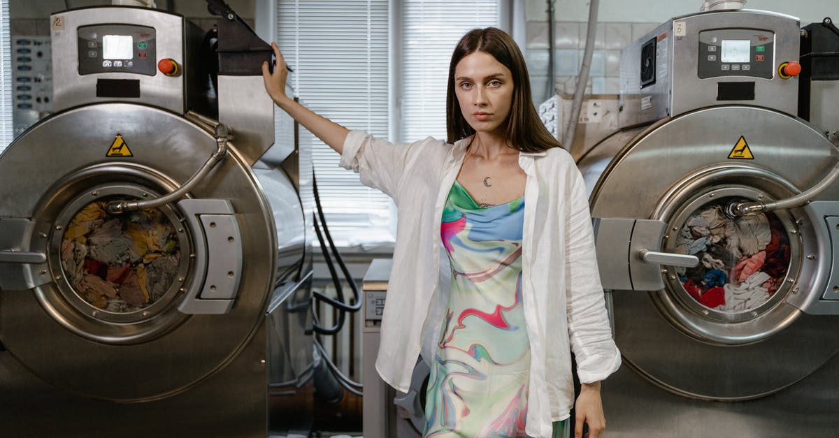 Whats the difference between the hoverbikes? - Woman Standing Between Washing Machine Whats the difference between the hoverbikes? - Woman Standing Between Washing Machine