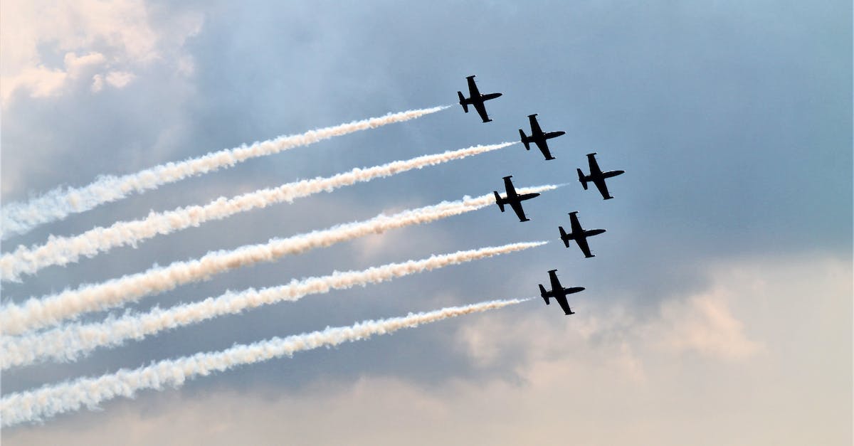 When are Bombers better than Sprayers? - Four Fighter Planes in Mid Air When are Bombers better than Sprayers? - Four Fighter Planes in Mid Air