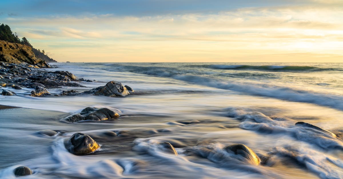 When breaking honeyfruit, how long does the health packs last? - Black Rocks on Sea Water Under White Clouds and Blue Sky