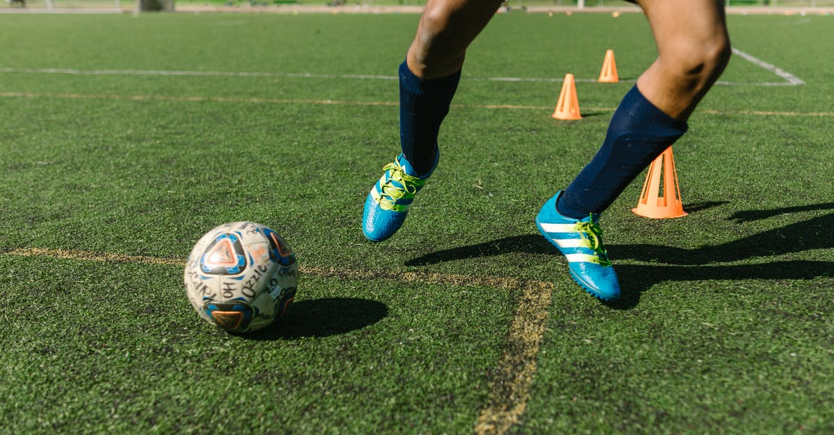 When do I punch the ball in Lucioball? - Man in Blue Sneakers Playing Football When do I punch the ball in Lucioball? - Man in Blue Sneakers Playing Football