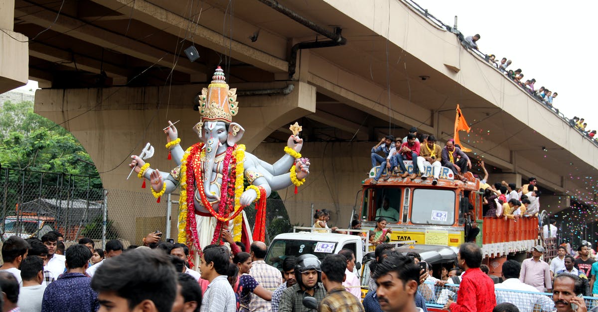 When does festival of the lost end? - People in Yellow and Red Costume Standing on Stage