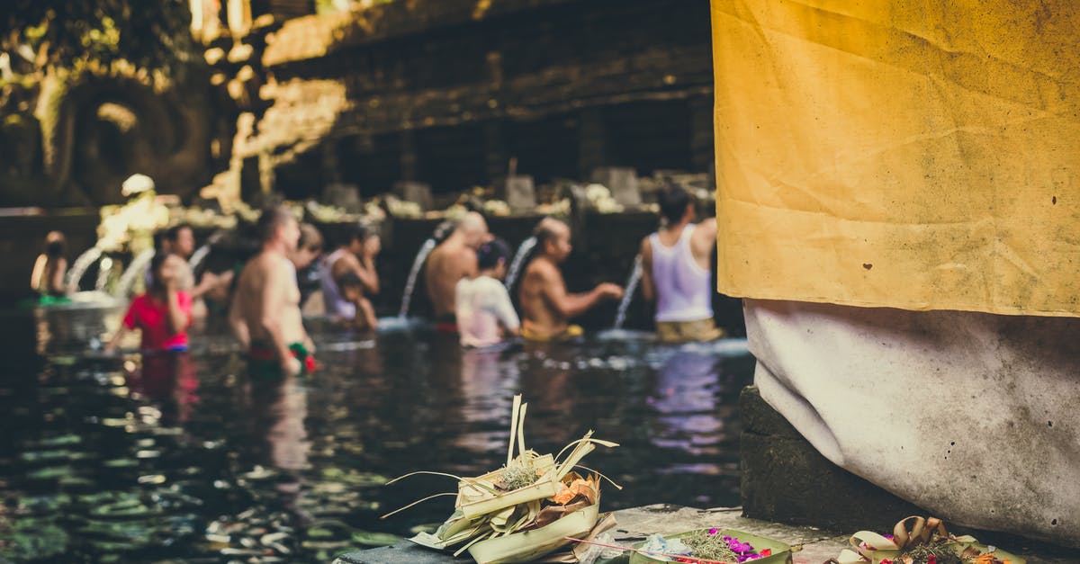 When does Katrina offer purification after bad luck in ACNH? - Photo of People in the Body of Water Taking a Bath