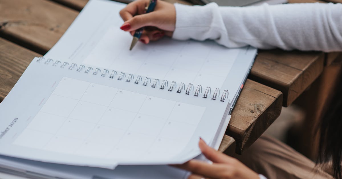 When does Rao turn Evil? - Crop woman making schedule in planner