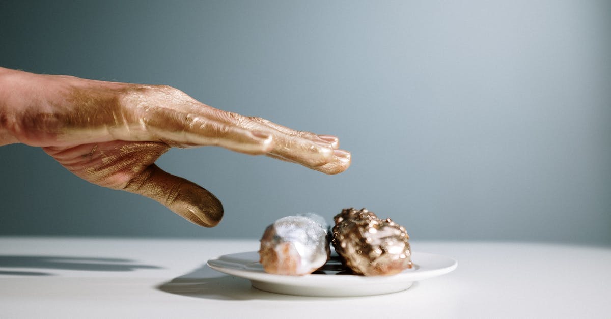 When does the 'Date' occur at Golden Saucer? - Photo Of Person With Gold Hands