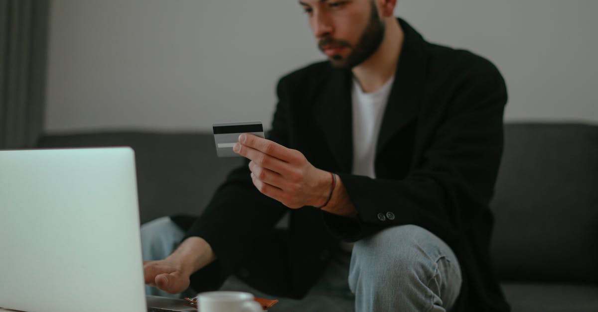 When does the Steam discovery queue card availability reset? - Man in Black Sweater Holding Smartphone When does the Steam discovery queue card availability reset? - Man in Black Sweater Holding Smartphone