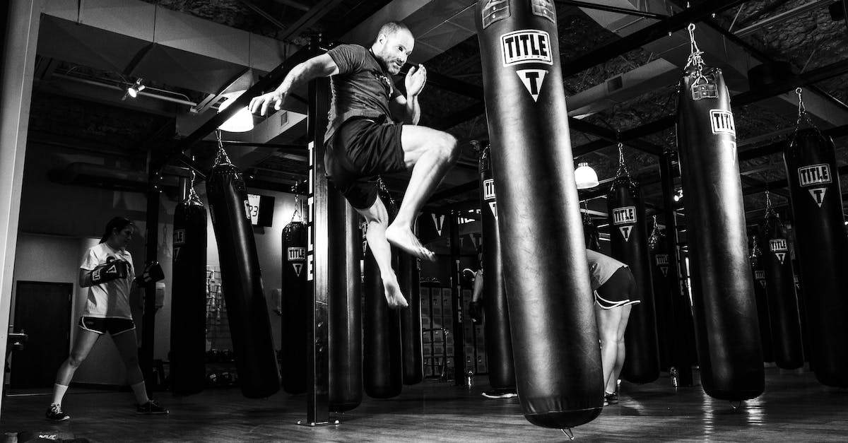 When does the Town Shield kick in after an attack? - Man Kicking Heavy Bag