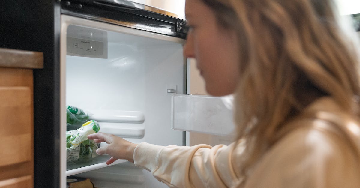 When does your health get automatically refilled? - Woman in Brown Long Sleeve Shirt Looking in the Refrigerator When does your health get automatically refilled? - Woman in Brown Long Sleeve Shirt Looking in the Refrigerator