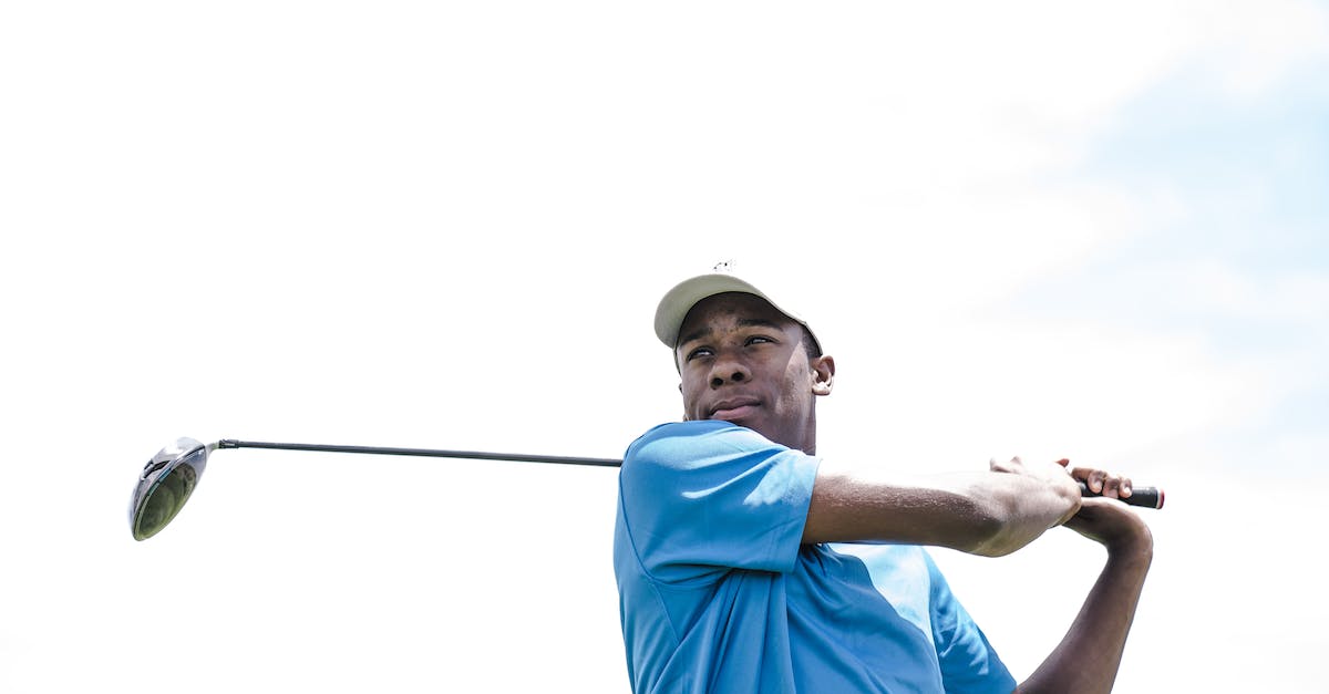 When I swing the Wii remote, the game pauses - Man Wearing Blue Shirt Playing Golf