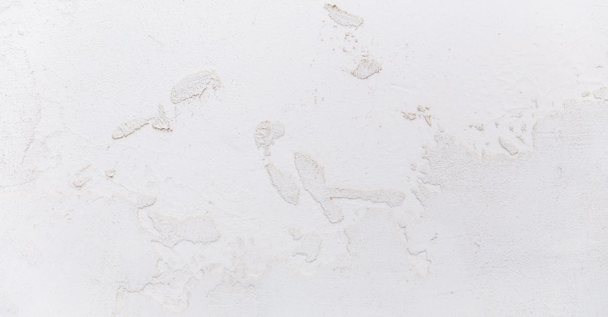 When is it desirable to miss color block or hit spikes? - White shabby concrete wall with cracked stucco When is it desirable to miss color block or hit spikes? - White shabby concrete wall with cracked stucco