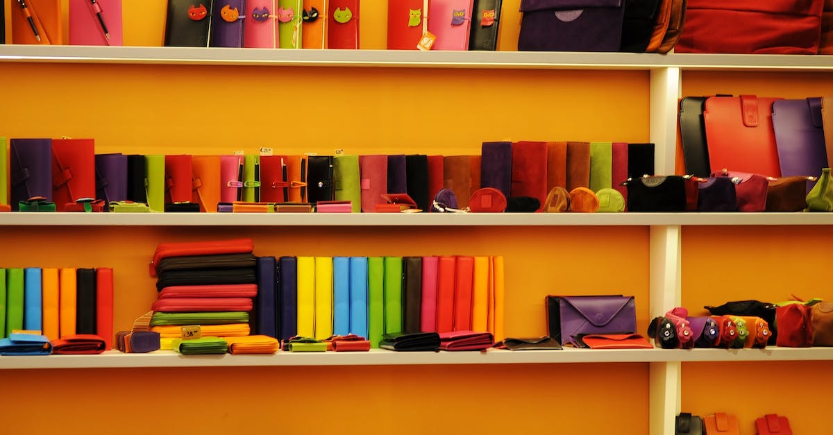 When is it safe to sell books and contracts? - Assorted-color Leather Wallets and Bags on White Shelf When is it safe to sell books and contracts? - Assorted-color Leather Wallets and Bags on White Shelf